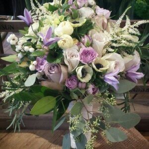bridal bouquet in whites and purples