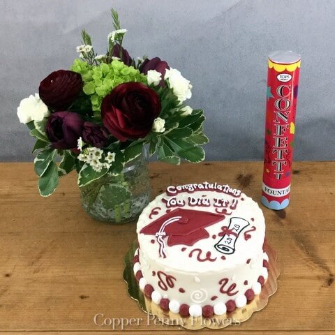 Graduation Congratulations Package features a cake, flowers, and a confetti toweron Graduation