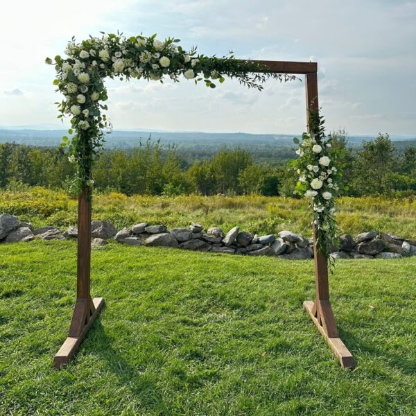brown wood wedding arbor