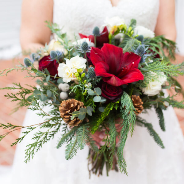 winter wedding bridal bouquet red white greens