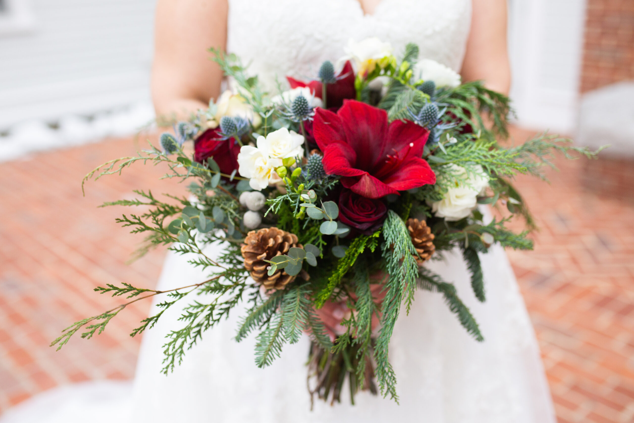 winter wedding bridal bouquet red white greens