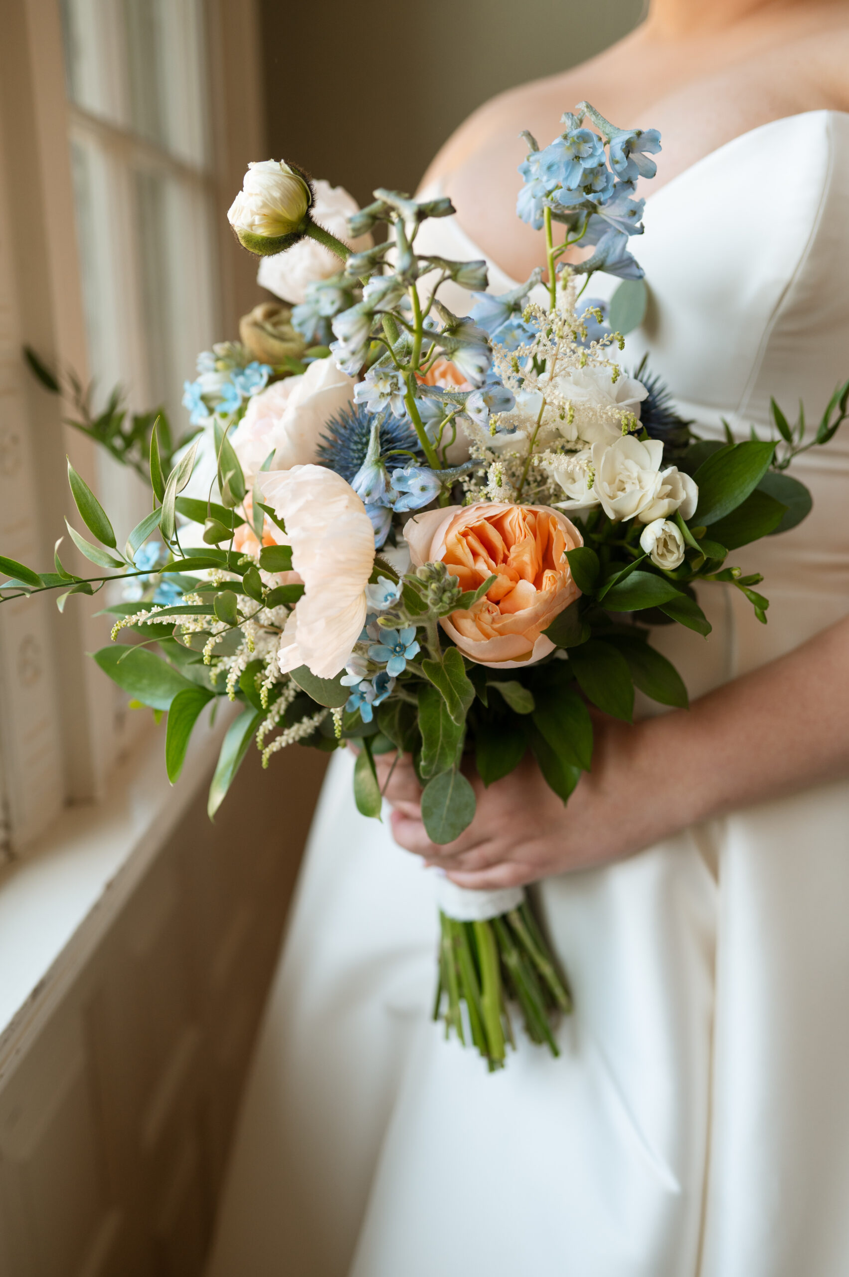 Peach white blue pastel wedding bouquet