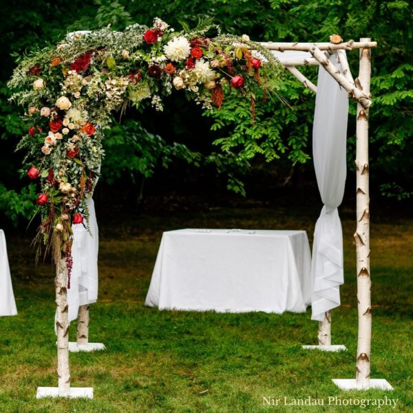 wooden birch wedding arbor chuppah