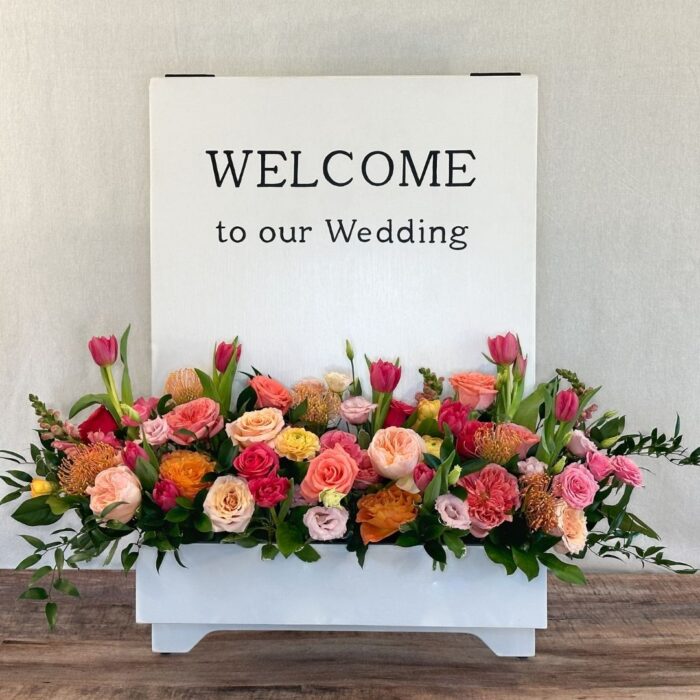 floral welcome sign
