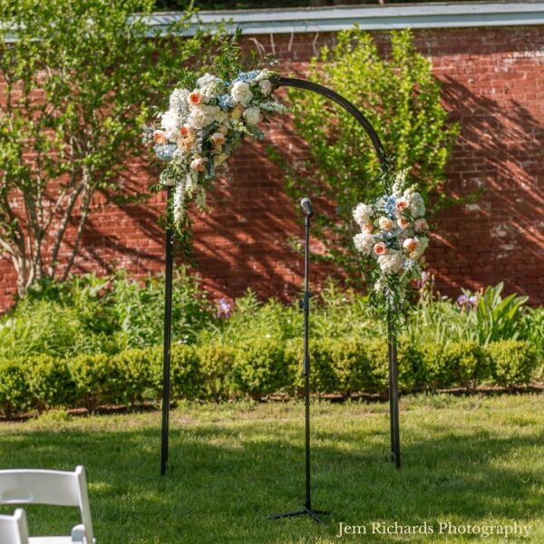 arched metal wedding arbor