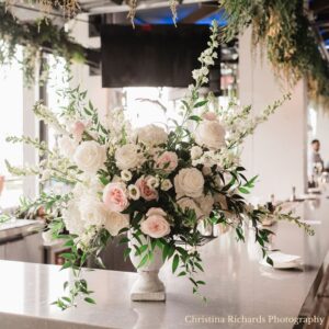 large footed urn flowers