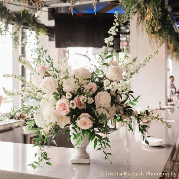 large footed urn flowers