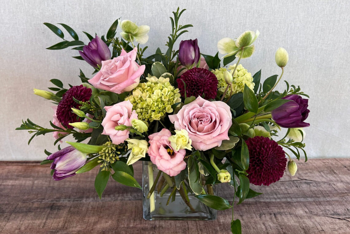 Mint Tulip is a lavender, mint green, and purple flower arrangement