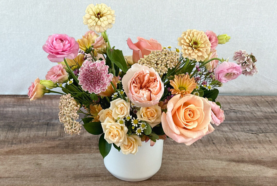 Peach of My Heart features peachy and soft pink blooms including garden roses and roses