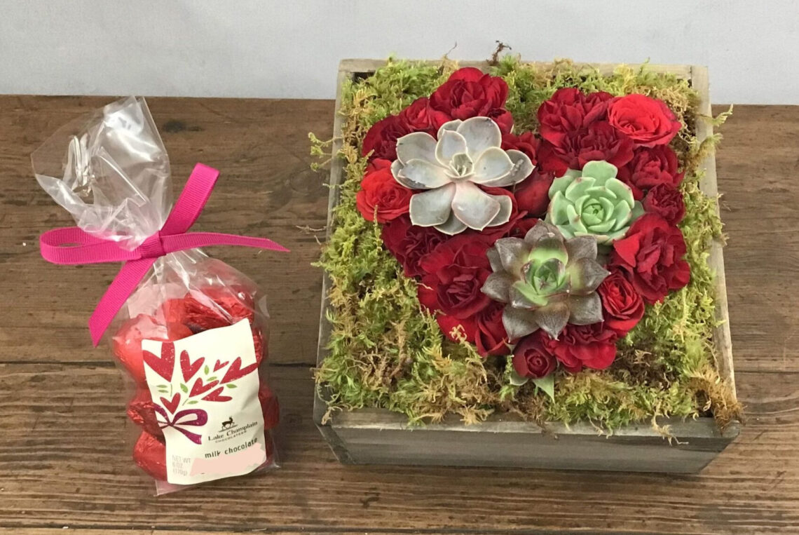 Only You is a pave heart made of red roses and succulents with moss in a wooden box delivered with Lake Champlain chocolates