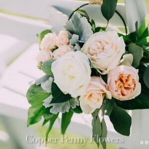 wedding flowers on a chair from our last lexington event